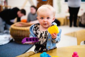 Child playing with toys